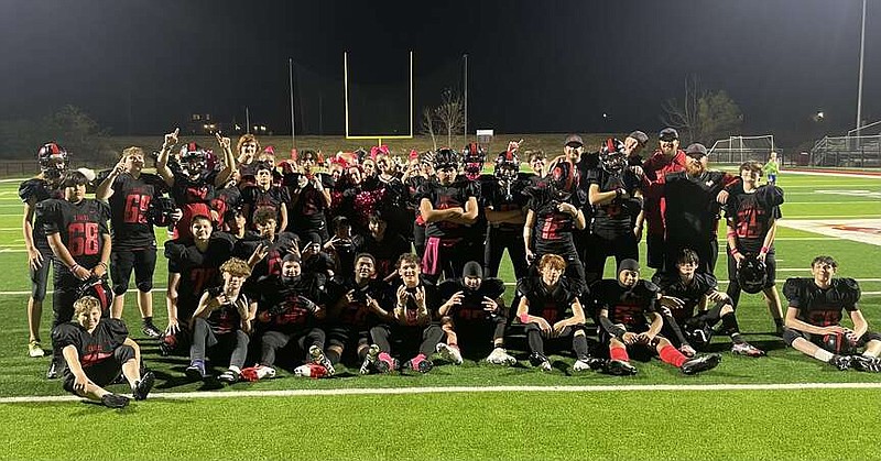 The Cutter Morning Star junior high football team celebrates its conference runner-up finish, Oct. 31, on Eagles Field. (Submitted photo)