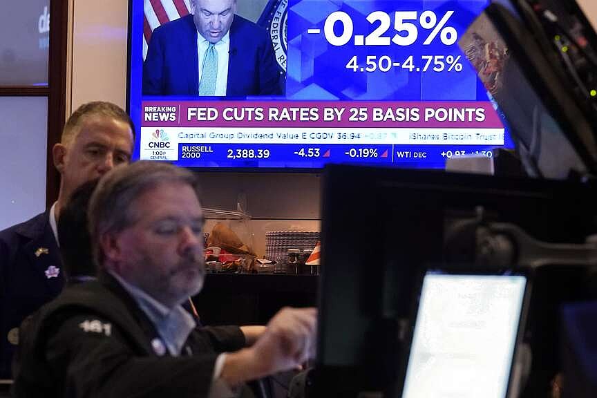 Most of Wall Street rises after the Fed cuts interest rates | Texarkana ...