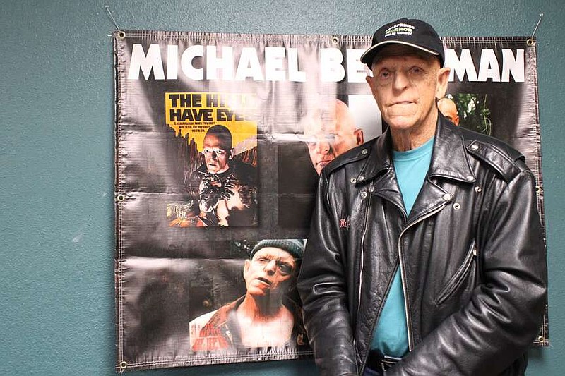 Michael Berryman of "The Hills Have Eyes" and many more projects stands at his table during the Hot Springs International Horror Film Festival. (The Sentinel-Record/Braden Sarver)