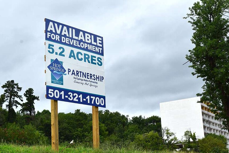 A sign advertises the Majestic Hotel site in July 2023. The Hot Springs Metro Partnership is marketing the now city-owned Park Avenue property. (The Sentinel-Record/Donald Cross/File)