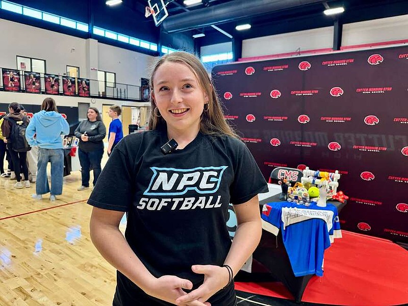 Cutter Morning Star senior pitcher Jalea Hawthorn is pictured at Eagle Arena on Friday for her signing day to play softball at National Park College. (The Sentinel-Record/Bryan Rice)