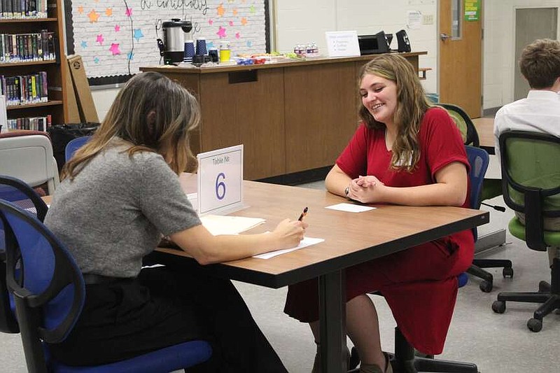 Smackover students are interviewed by representatives from area businesses and companies as part of their professional communications class, which focuses on developing communication skills for job interviews, as well as non-verbal communication. Baylee Franklin/Special to the News-Times.