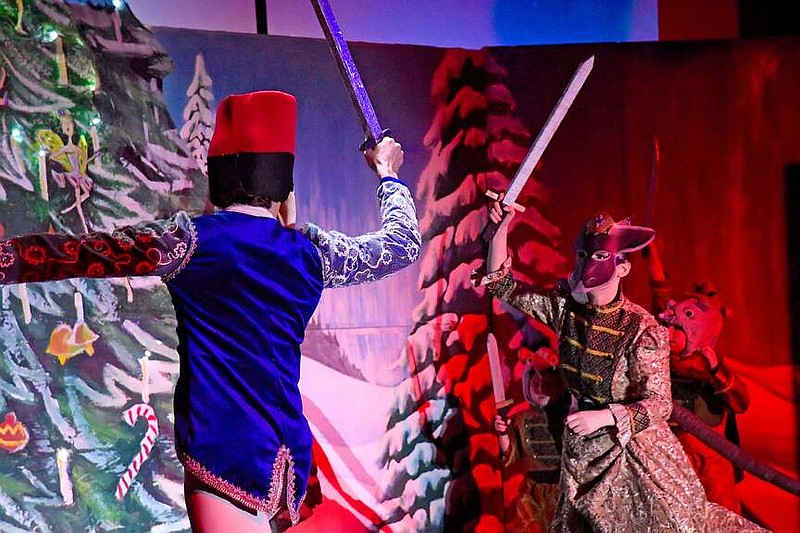 An action sequence is practiced during a dress rehearsal held on Wednesday afternoon for "The Nutcracker." (The Sentinel-Record/Donald Cross)