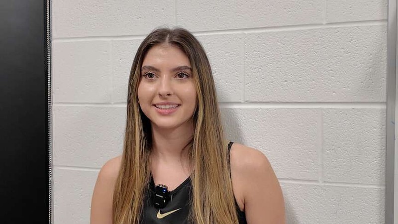 Hot Springs senior Beth Ann Mullenix is pictured in head coach Josh Smith's office on Nov. 12, before basketball practice at Trojan Arena. (The Sentinel-Record/Bryan Rice)