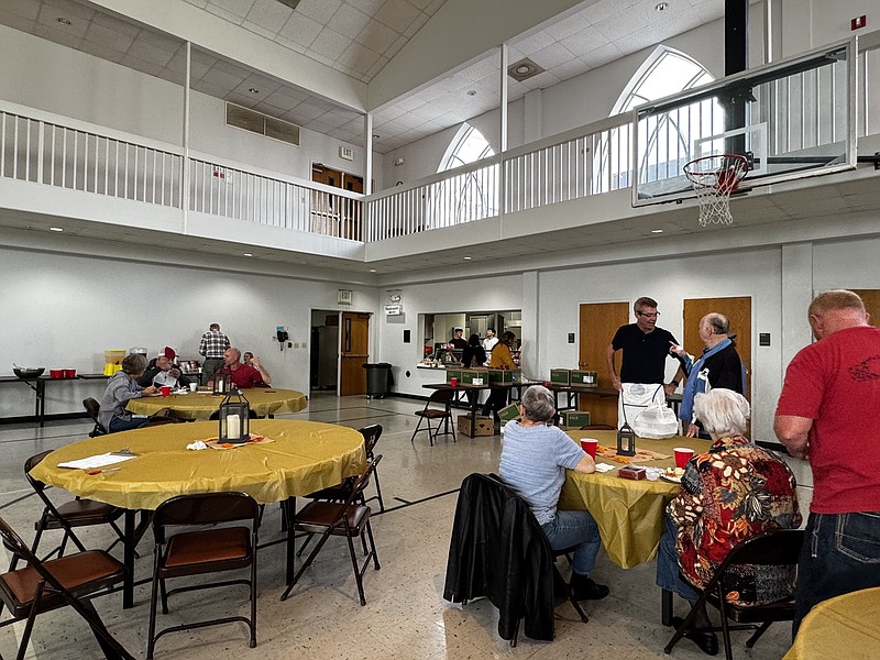 Local residents visit First United Methodist Church in Camden for a Thanksgiving meal.
(photo by Kate Flynn)