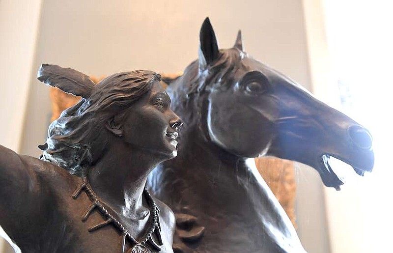 A bronze model of “The Visitor” by Longhua Xu, which will be erected in the center of the Hill Wheatley Plaza fountain, is shown in August. (The Sentinel-Record/Donald Cross/File)