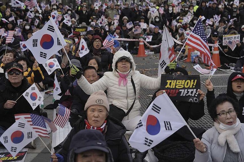 South Korea’s president replaces defense minister as parliament moves