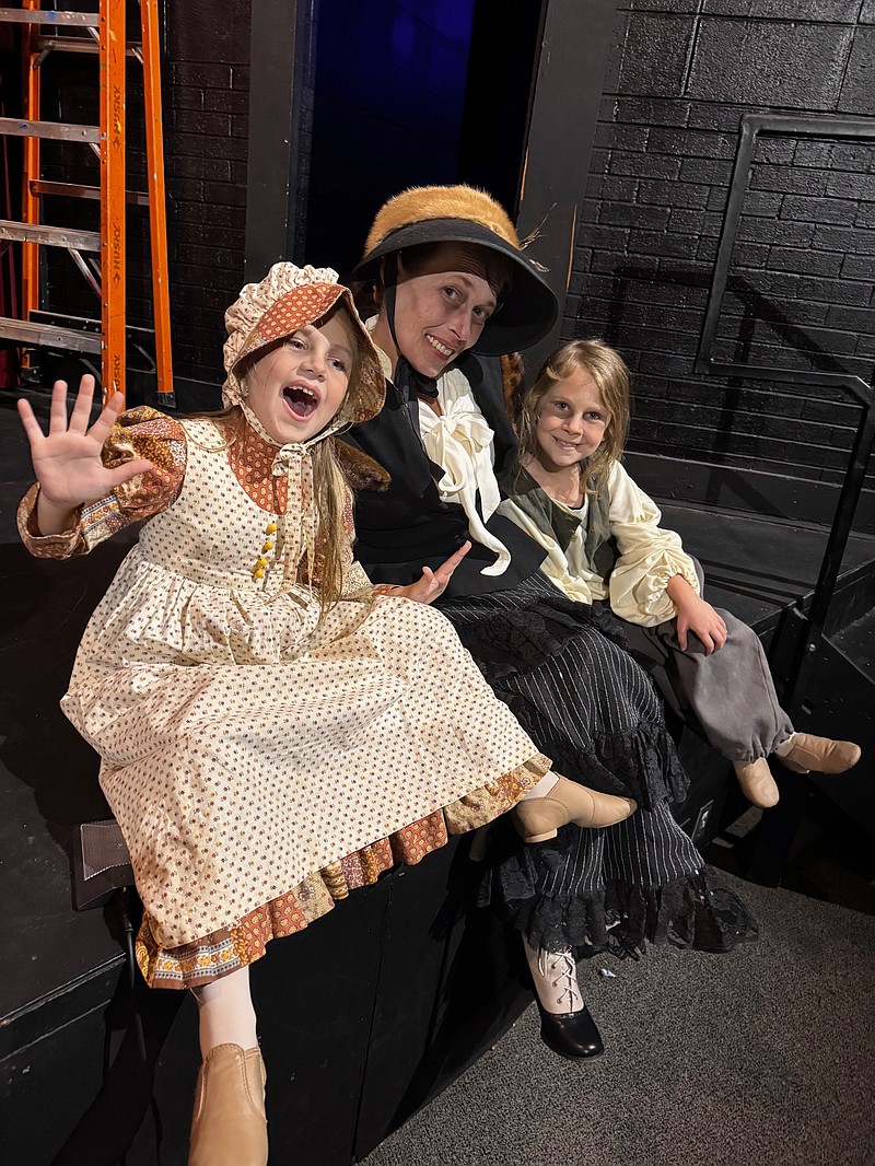 Courtesy photo
Kate Flynn is flanked by her stage children Adeline and Quinn Emery during a SAAC production of 'A Christmas Carol;