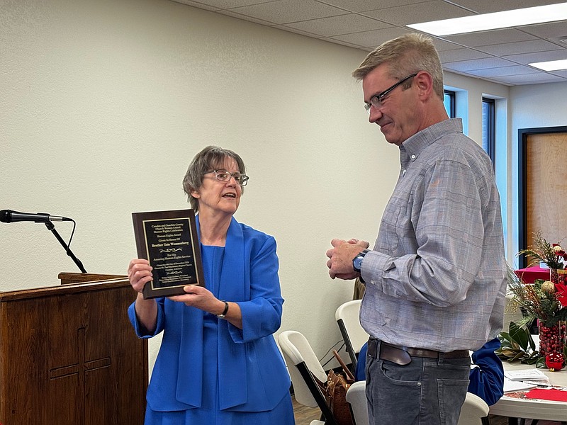 Ellen Horseman presents Tate Wunnenberg with Human Right Award
(photo by Kate Flynn)