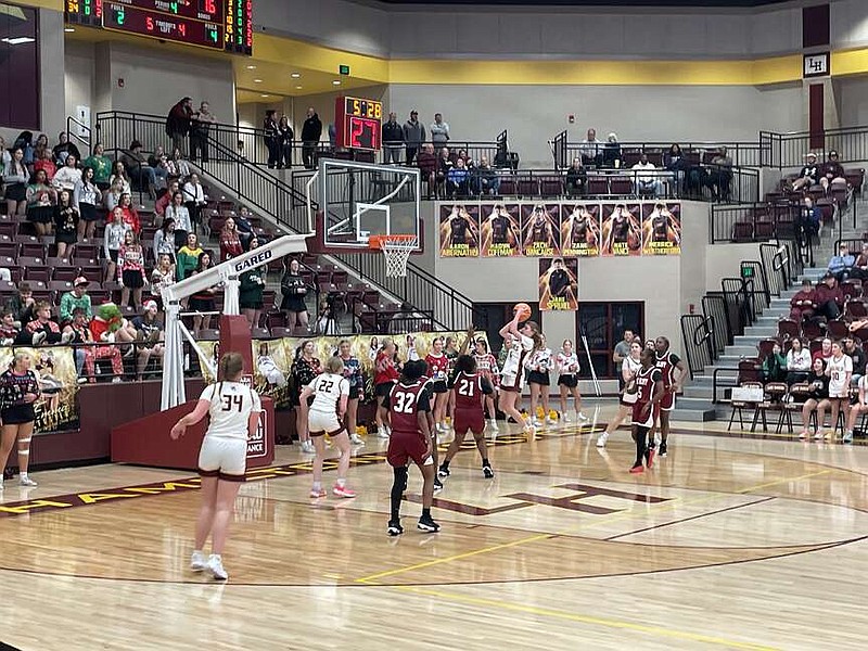 Lake Hamilton sophomore Adalyn Wilkerson (1) drives the paint for the inside shot Tuesday night against Pine Bluff at Wolf Arena. (The Sentinel-Record/Braden Sarver)