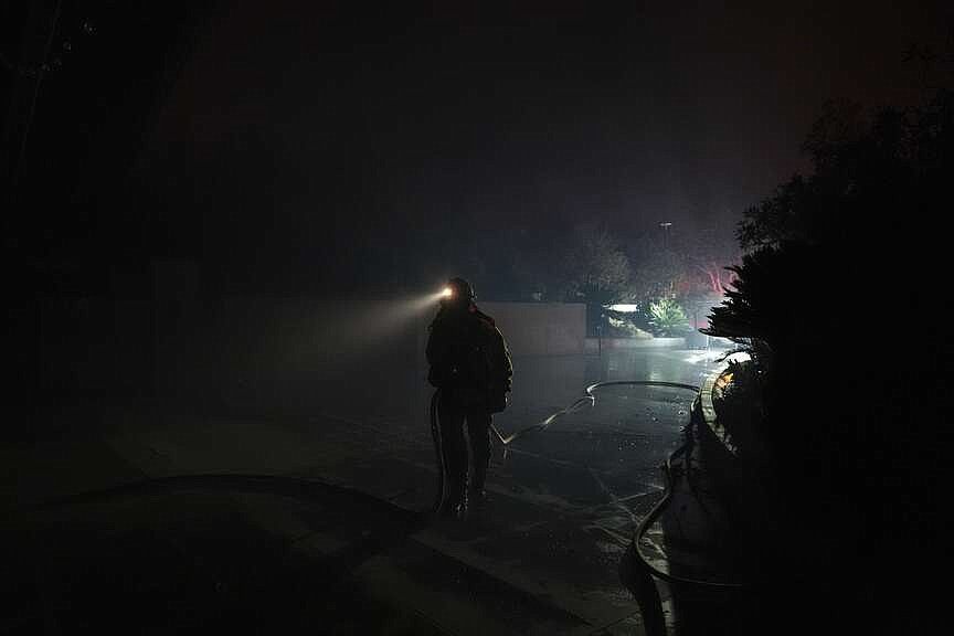 Malibu wildfire grows, but firefighters get break from improving