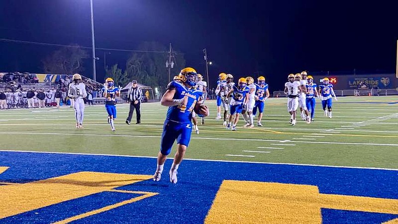 Lakeside senior running back Grady Ohman scores a touchdown against Hot Springs on Nov. 8 at Chick Austin Stadium. (The Sentinel-Record/Bryan Rice)