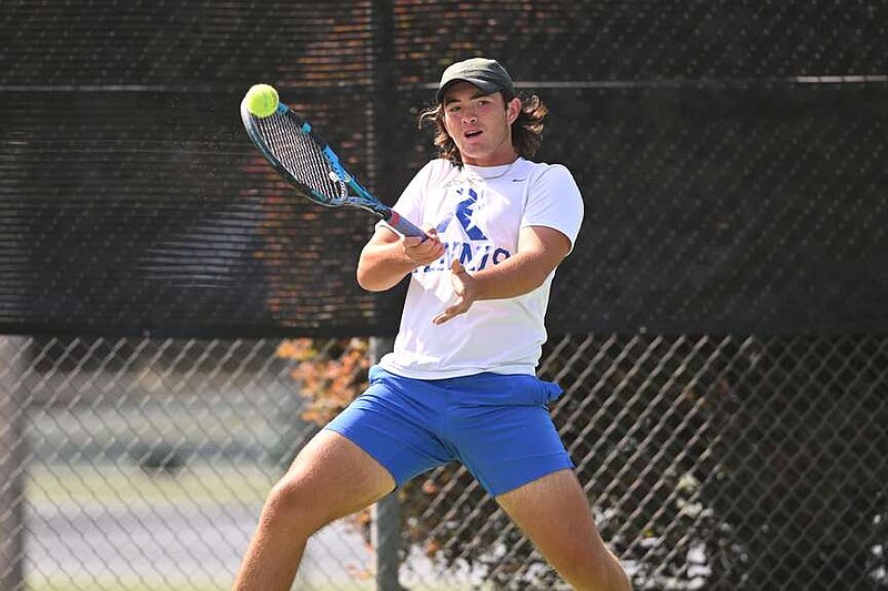 Rogers' Harrison Deer returns a shot during the 6A boys state tennis tournament in October in North Little Rock. Deer won the state Overall tournament and was an all-state selection. 
(Arkansas Democrat-Gazette/Staci Vandagriff)