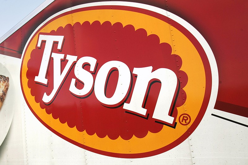 FILE - A Tyson Foods logo is seen on a truck parked at a food warehouse in Little Rock, Ark., on Oct. 28, 2009. (AP Photo/Danny Johnston, File)