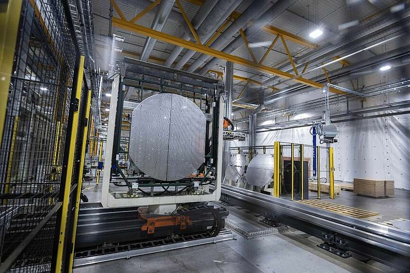 A machine is operated at a facility for the Norwegian company Nel in Heroya, Norway, on April 20, 2023. Nel makes devices that take water and split it into hydrogen and oxygen, known as electrolyzers, as well as fueling stations. (AP Photo/Trond R. Teigen, File)