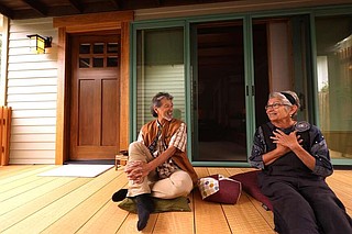 Elizabeth Altounian, 75, enjoys a light moment with Toshi Kawabata, of Barr-Ban Wood Works, who did the carpentry for Altounian's new Kyoto-style traditional Japanese ADU in South Pasadena on Sept. 20, 2024. (Genaro Molina/Los Angeles Times/TNS)
