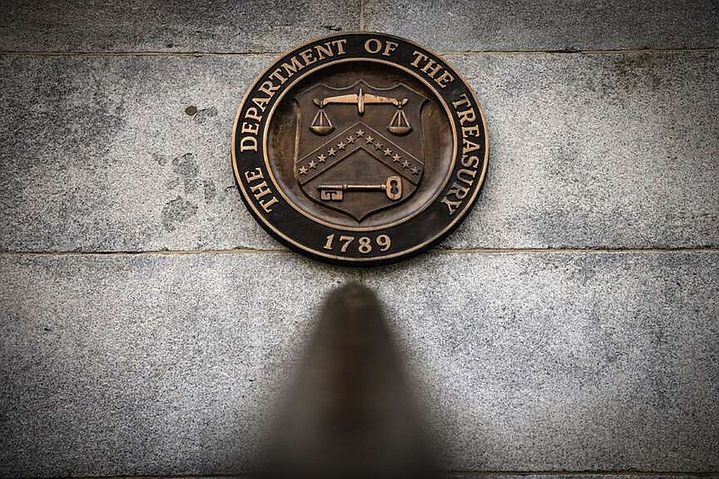 The U.S. Treasury building is seen Dec. 19, 2021, in Washington. (Bloomberg photo by Samuel Corum)