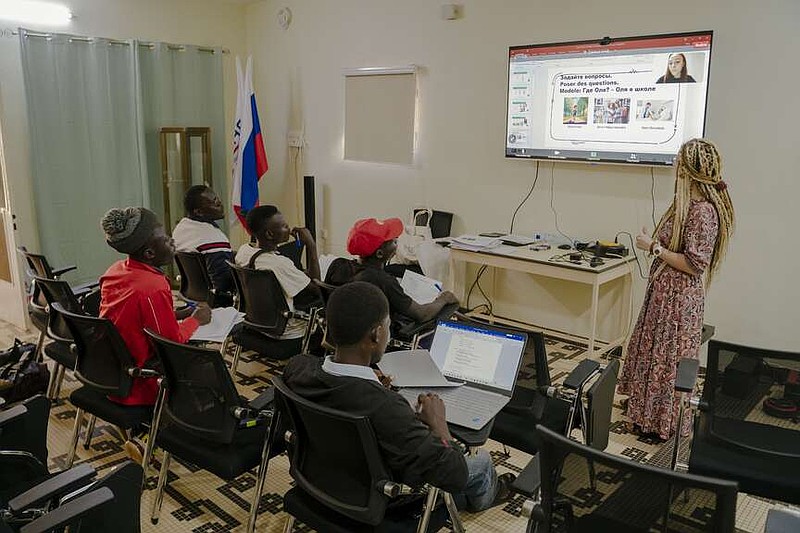 Students take part in an online Russian-language course at La Maison Russe, or "the Russian House," in Ouagadougou, Burkina Faso. (Carmen Yasmine Abd Ali for The Washington Post)