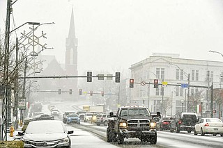River Valley residents wake to power outages, snow covered roads ...