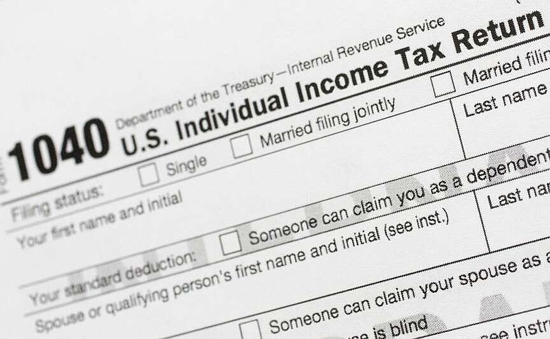 Part of a 1040 U.S. Individual Income Tax Return form is shown July 24, 2018, in New York. (AP Photo/Mark Lennihan, File)