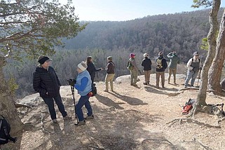 Hikers including Nese Nemec (from left) and Judy Tobler chat during a visit Jan. 3 to Kings River Overlook in the McIlroy Madison County Wildlife Management Area. Visit nwaonline.com/photo for today's photo gallery.
(NWA Democrat-Gazette/Flip Putthoff)
