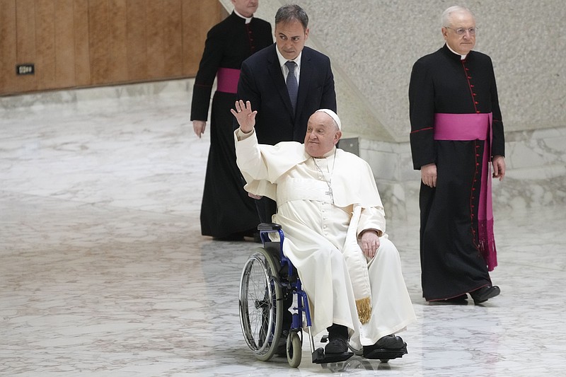 Pope Francis meets with pilgrims and faithful participating into the 2025 jubilee in the Paul VI hall at the Vatican, Saturday, Jan. 11, 2025. (AP Photo/Gregorio Borgia)