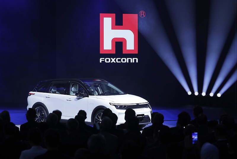 FILE - Foxconn's Foxtron Model C electric car is displayed during the Hon Hai Tech Day (HHTD 24) at the Nangang Exhibition Center in Taipei, Taiwan, Oct. 8, 2024. (AP Photo/Chiang Ying-ying, File)