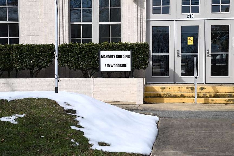 A sign in front of the Garland County Armory Building still refers to it as the Mahoney Building. (The Sentinel-Record/Donald Cross)