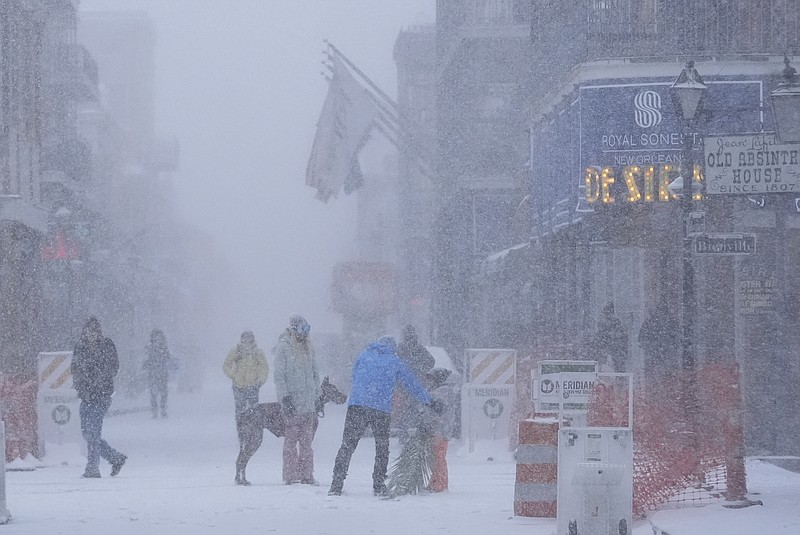 Frigid storm drops rare snow on Houston and New Orleans as Florida