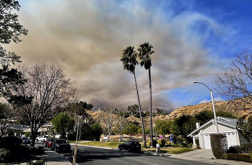 Evacuations ordered north of Los Angeles as new fast-moving wildfire ...