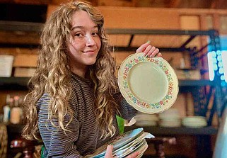 Tarryn Pitt with some of the thrift store plates she found for her wedding dinner in Oregon. She made sure that all of the plates were free of lead after buying them for $1 to $3 each. MUST CREDIT: Tarryn Pitt