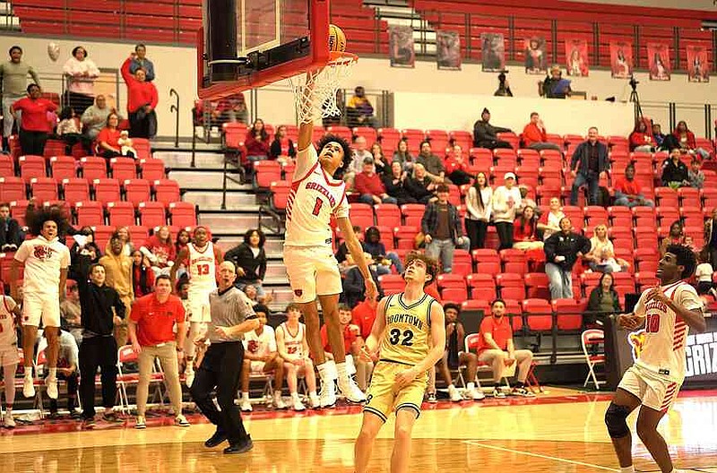 Fort Smith Northside's Derek Shepard (1) dunks in the second quarter of Northside's 77-64 win against Bentonville at Northside Arena on Friday.
(Special to River Valley Democrat-Gazette/Ron Green)