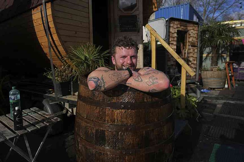 Callum Heinrich enjoys his sauna meeting at the Hackney Wick Community Sauna Baths on February 25, 2025 in London. (AP Photo/Kin Cheung)