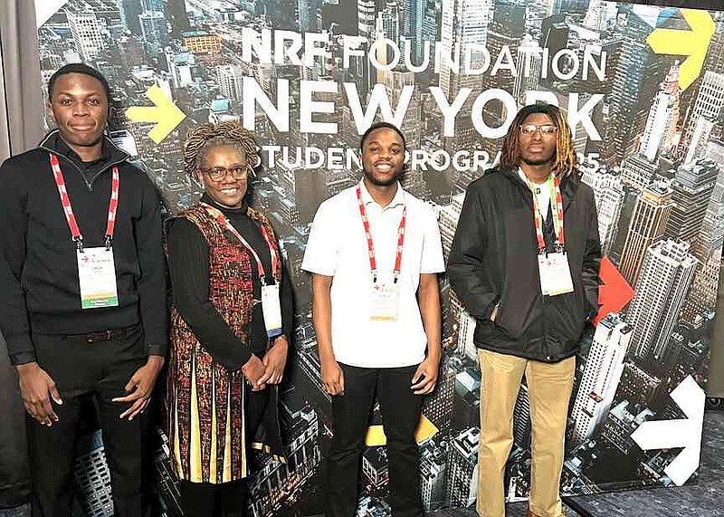The National Retail Federation Student Program in New York City provides opportunities for students to connect with some of the world's largest retail brands. University of Arkansas at Pine Bluff participants recently included Simon Chambo, left, Associate Professor Jane Opiri, Gerald Shimo and Jonathan Black-Ross. (Special to The Commercial/University of Arkansas at Pine Bluff)