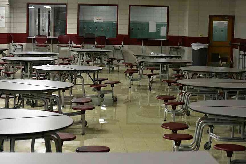 Rainwater is pictured on the floor inside the cafeteria at Pine Bluff High School's Jack Robey campus Friday, April 4, 2025. (Pine Bluff Commercial/I.C. Murrell)
