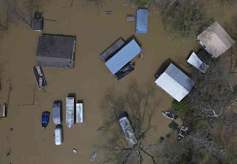 Swollen rivers are flooding towns in the U.S. South after a prolonged ...