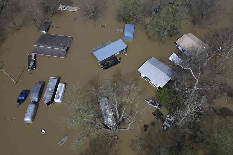 Swollen rivers are flooding towns in the U.S. South after a prolonged ...
