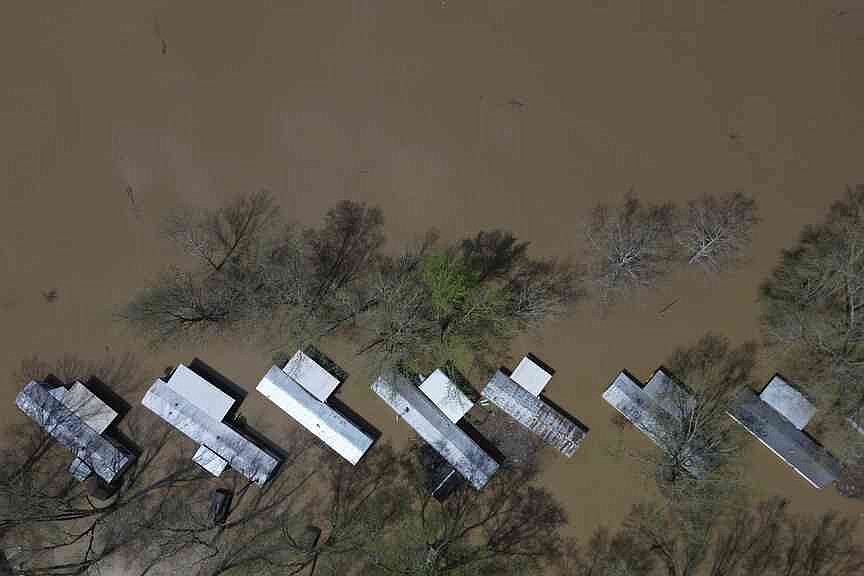 Swollen rivers flood towns in US South after prolonged deluge of rain ...