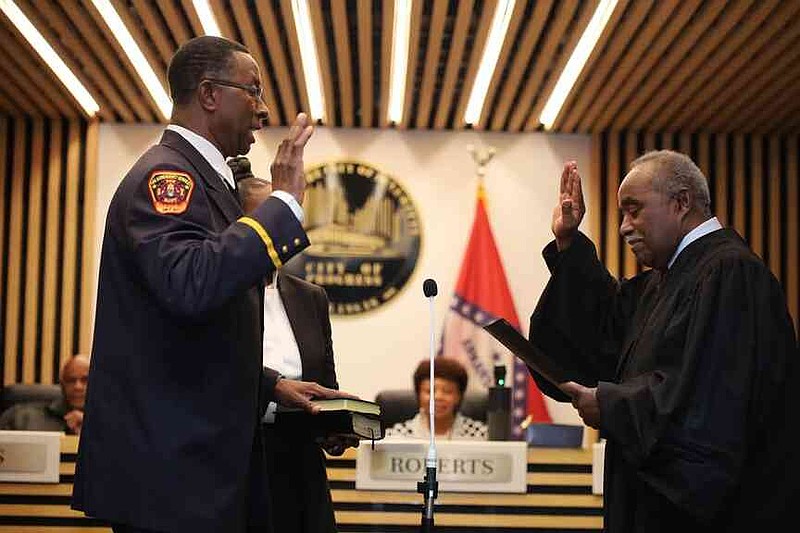 Randy Compton is sworn in as Interim Fire Chief. (Special to the Commercial/Andre Braswell)