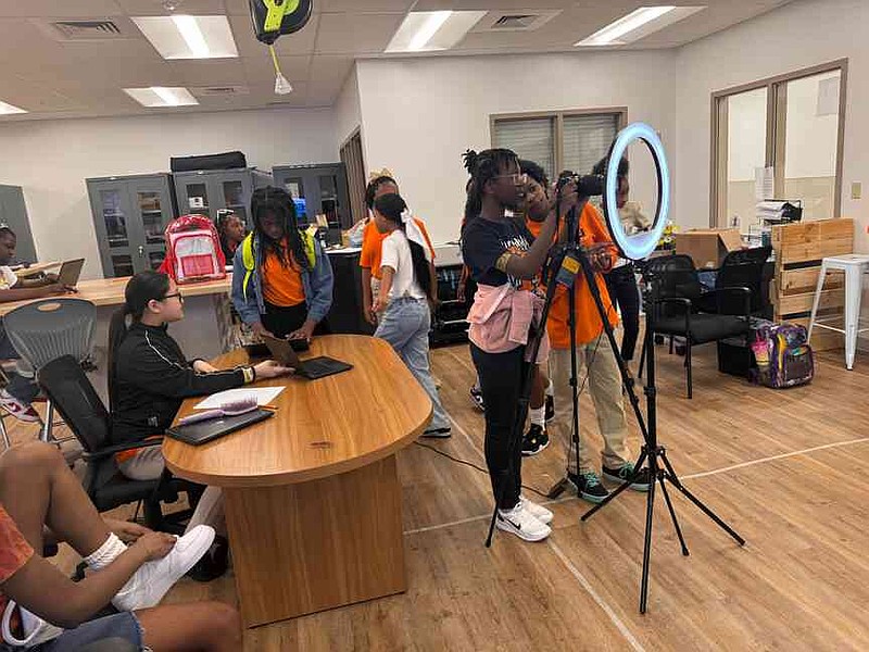 Students at Friendship Aspire Academy Southeast Campus record a podcast. (Special to The Commercial)