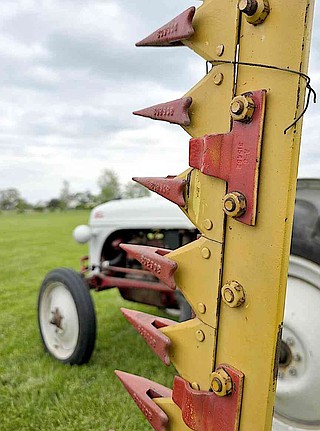 Randy Moll/Westside Eagle Observer
A side sickle bar mower was mounted on a Ford tractor at the Tired Iron of the Ozarks spring show in Gentry.