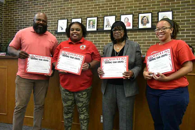 From left: Martell Huntley, Patricia Burnett, Carol Gardner and Kandace Sanders are among the Pine Bluff School District's building teachers of the year. (Pine Bluff Commercial/I.C. Murrell)