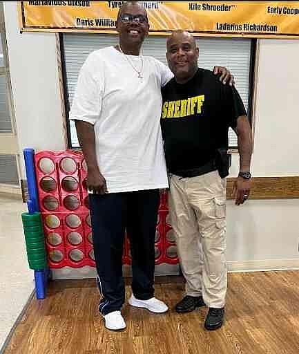 David Spicer poses with Major Byrone Miller. (Special to the Commercial)