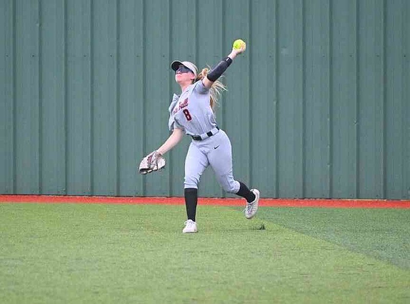 White Hall center fielder Jerrica Olson throws the ball back to the infield against Benton. (Special to the Commercial/William Harvey)