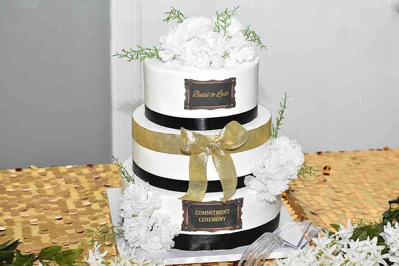 A three-tier cake awaits students participating in the "Build to Last" ceremony. (Pine Bluff Commercial/I.C. Murrell)