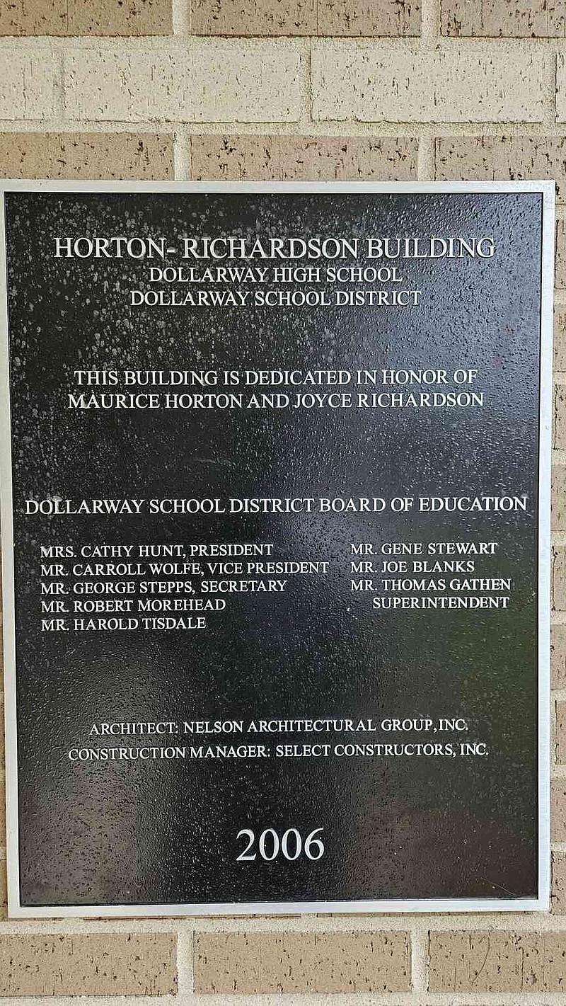 A dedication plaque honoring the Horton-Richardson Building at the former Dollarway High School campus on Dollarway Road is pictured Thursday, May 22, 2025. The building, now occupied by the Explore Academy, is named after Dollarway School District Superintendent Maurice Horton and teacher Joyce Richardson. (Pine Bluff Commercial/I.C. Murrell)