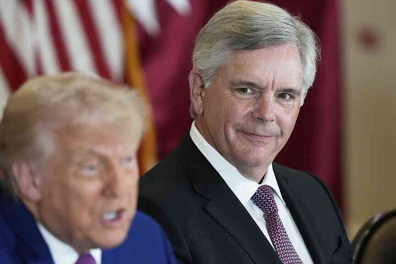 President Donald Trump speaks as Larry Culp, CEO of GE Aerospace, during a business roundtable, Thursday, May 15, 2025, in Doha, Qatar. (AP Photo/Alex Brandon)