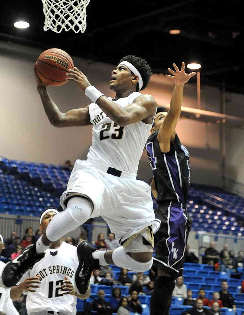 Hot Springs' Trey Lenox (23) goes for a basket during the Spa City Shootout game against Centerpoint at Bank of the Ozark Arena on Saturday, Dec. 27, 2014. (The Sentinel-Record/Mara Kuhn)
