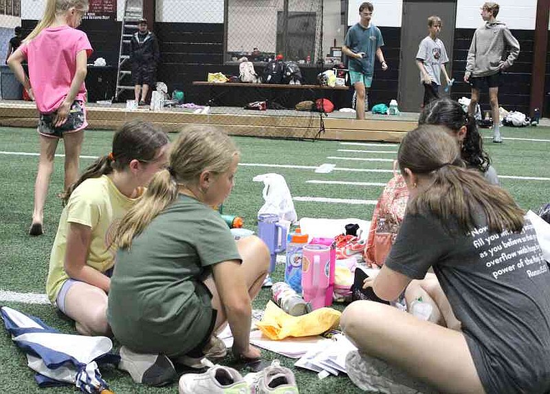Annette Beard/Pea Ridge TIMES Lil Hawks Track Camp was well attended last week and culminated with a water slide on Thursday afternoon. For more photographs, go to the PRT gallery at https://tnebc.nwaonline.com/photos/.