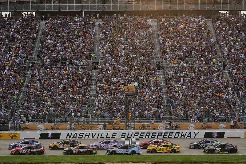 Drives speed past the green flag at the start of a NASCAR Cup Series auto race Sunday, June 1, 2025, in Lebanon, Tenn. (AP Photo/George Walker IV)